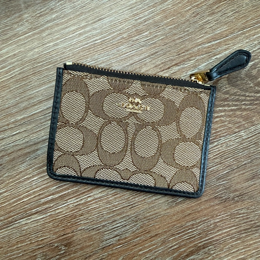 Coach Black and Gold Zipper Pouch